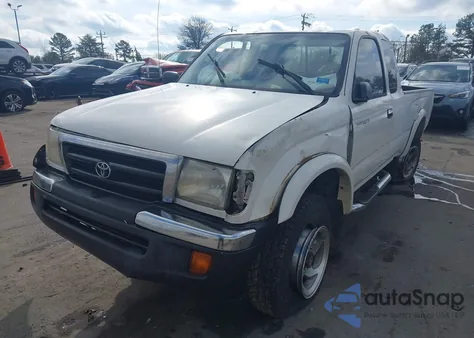 1999 Toyota Tacoma из США, поврежденный, VIN 4TAWM72NXXZ426411